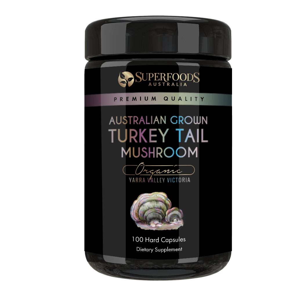 A miron violet glass jar labeled 'Australian Grown Turkey Tail Mushroom Capsules' by Superfoods Australia, indicating organic and premium quality. Organically grown in the Yarra valley Victoria Australia.