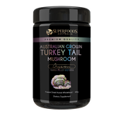 A black jar labeled 'Australian Grown Turkey Tail Mushroom Capsules' by Superfoods Australia, indicating organic and premium quality. Organically grown in the Yarra valley Victoria Australia.